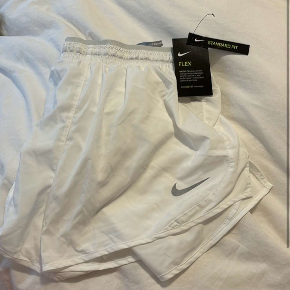 White NIKE running shorts